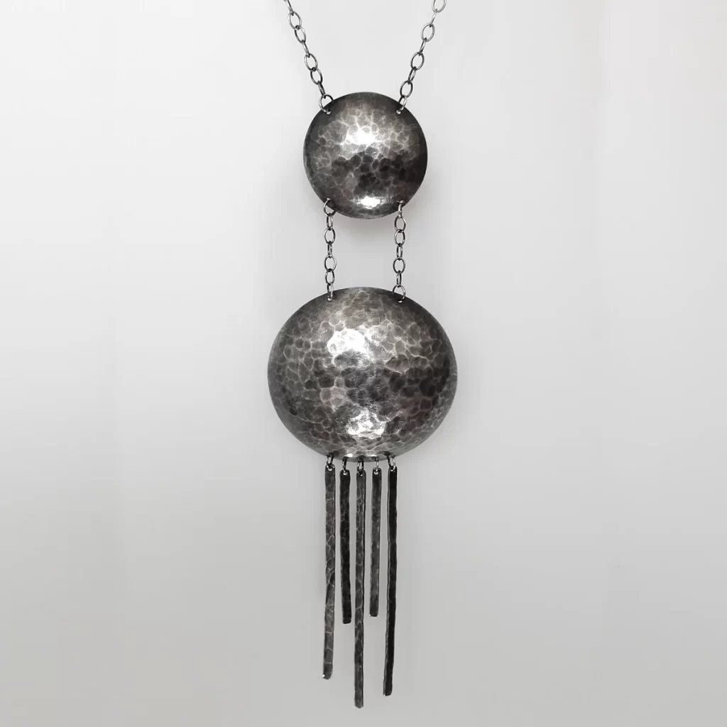 key party neckace on white