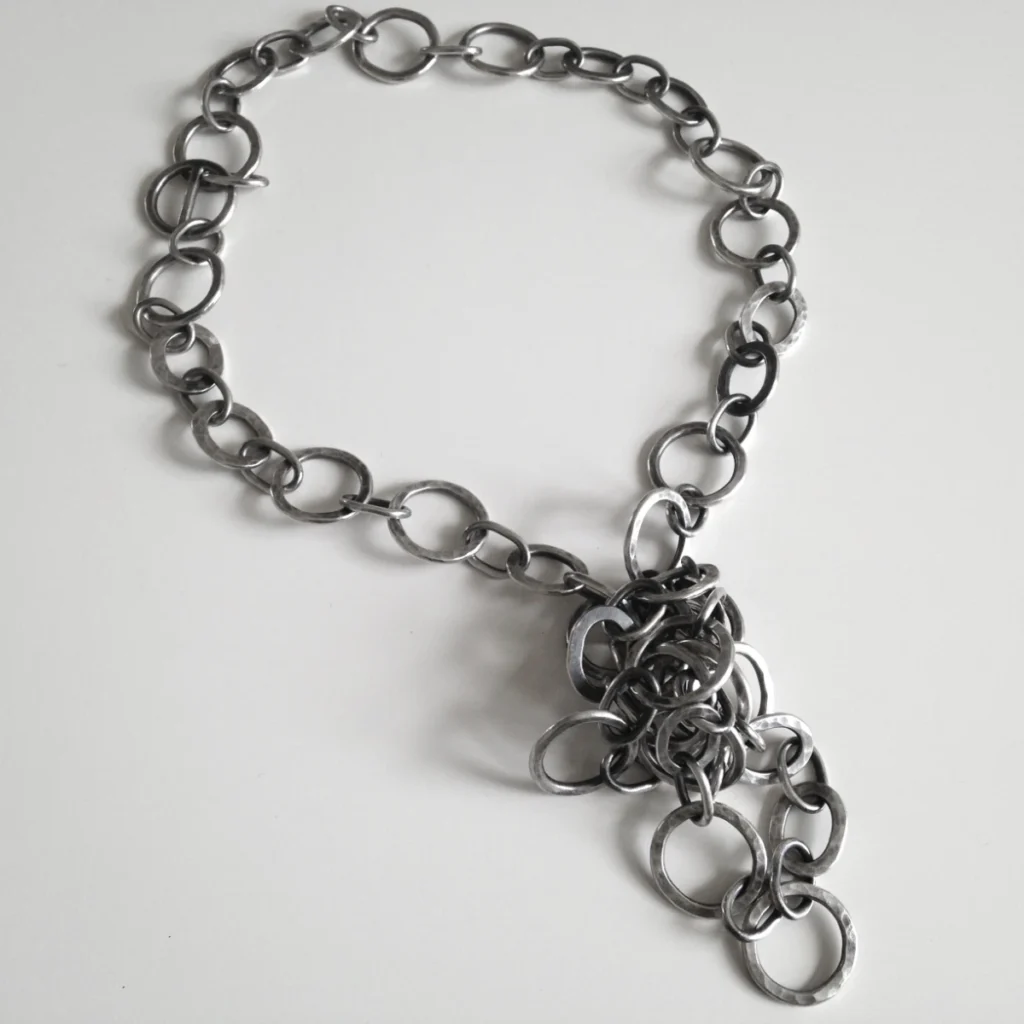 circles and ovals necklace in a knot